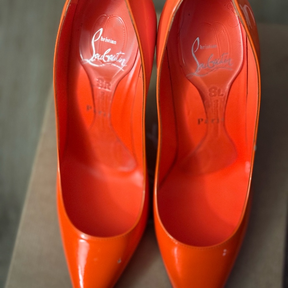 Christian Louboutin “Kate” - Bold Orange Heels